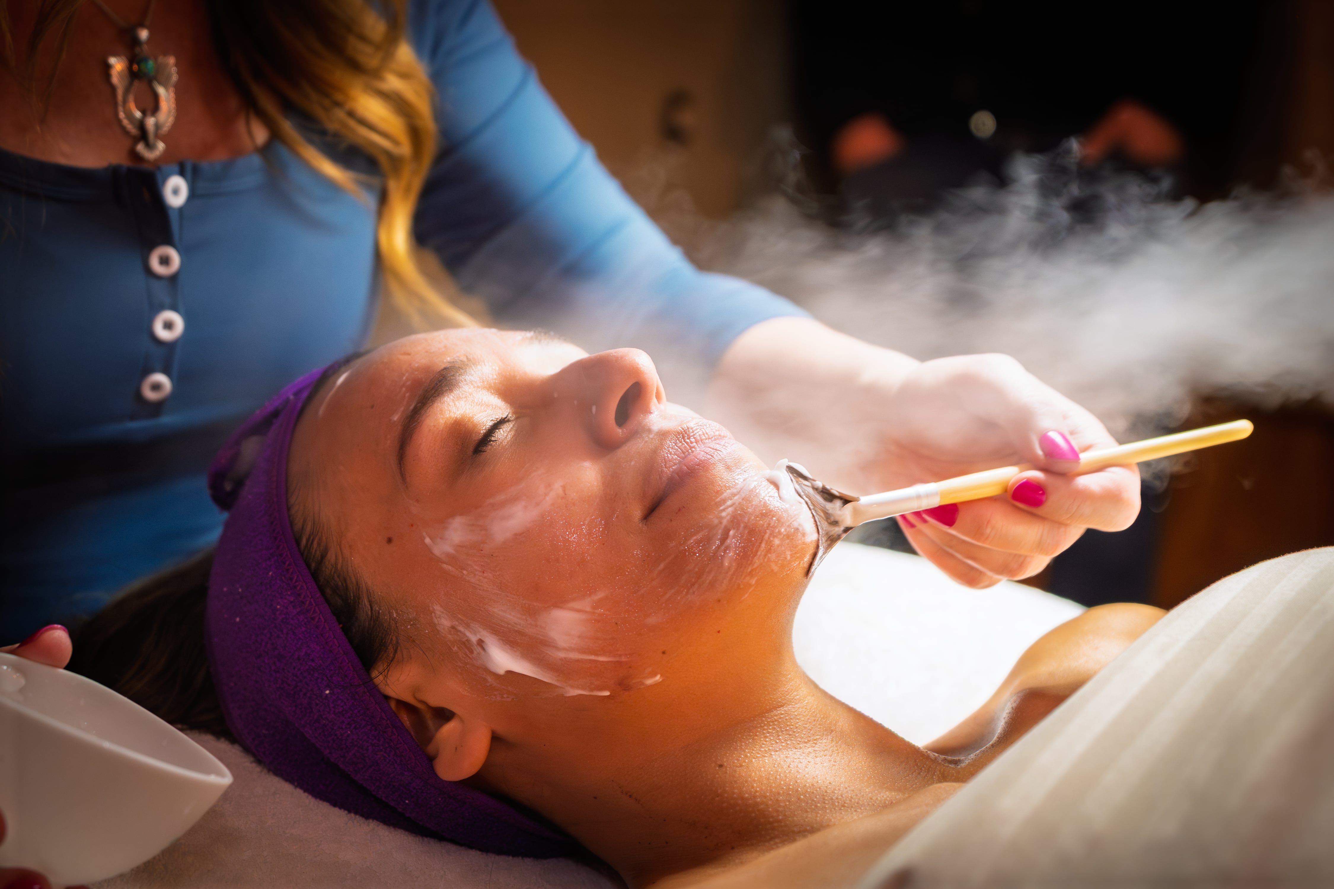 Amy working on a client during treatment